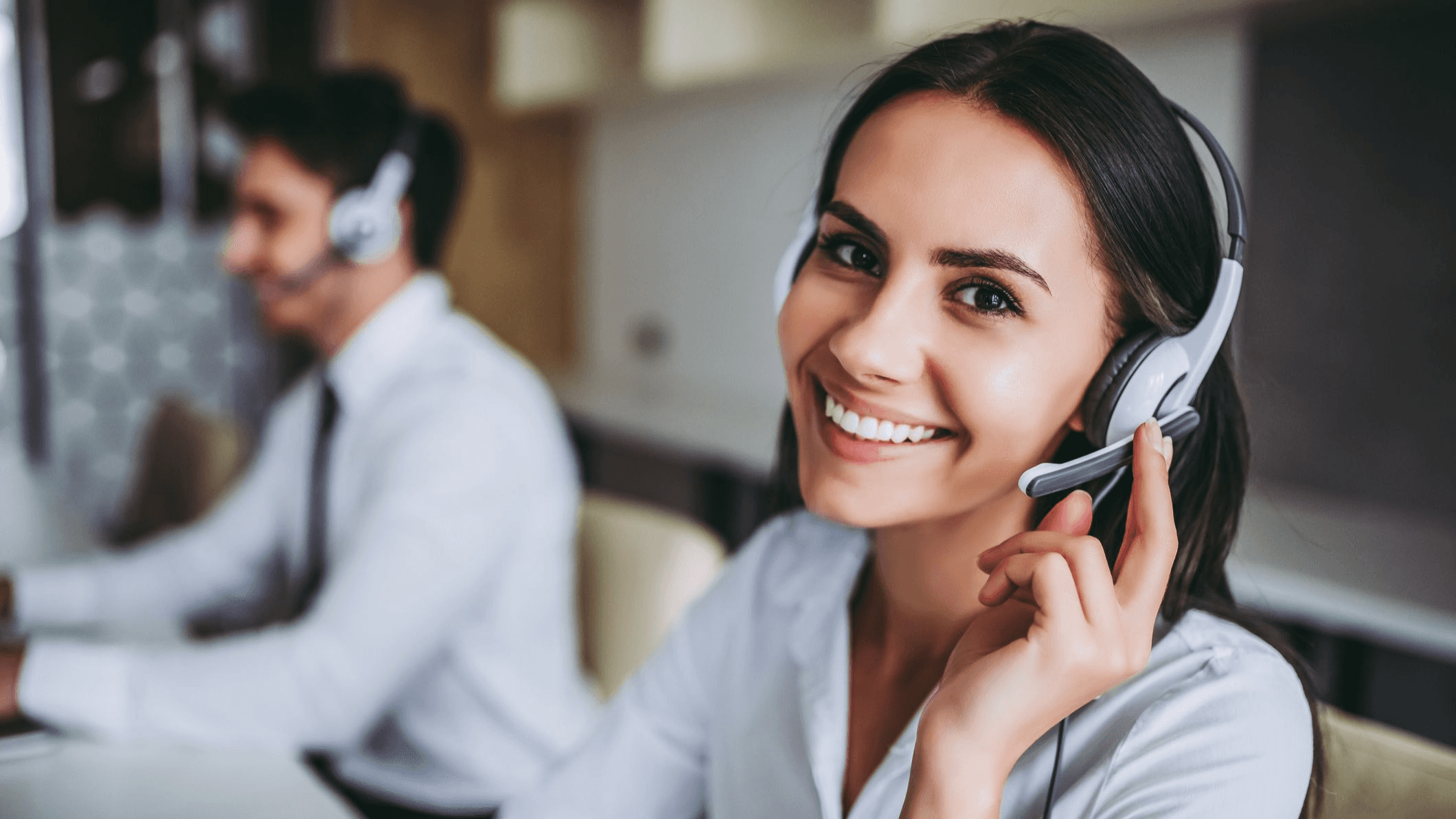 Customer service representative wearing headset - Handling Difficult Calls