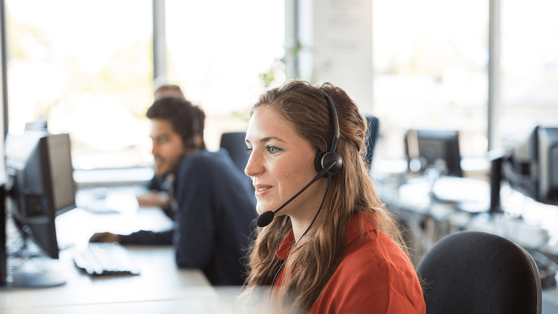  Customer service agents working in office -  How to De-Escalate a Customer Service Call