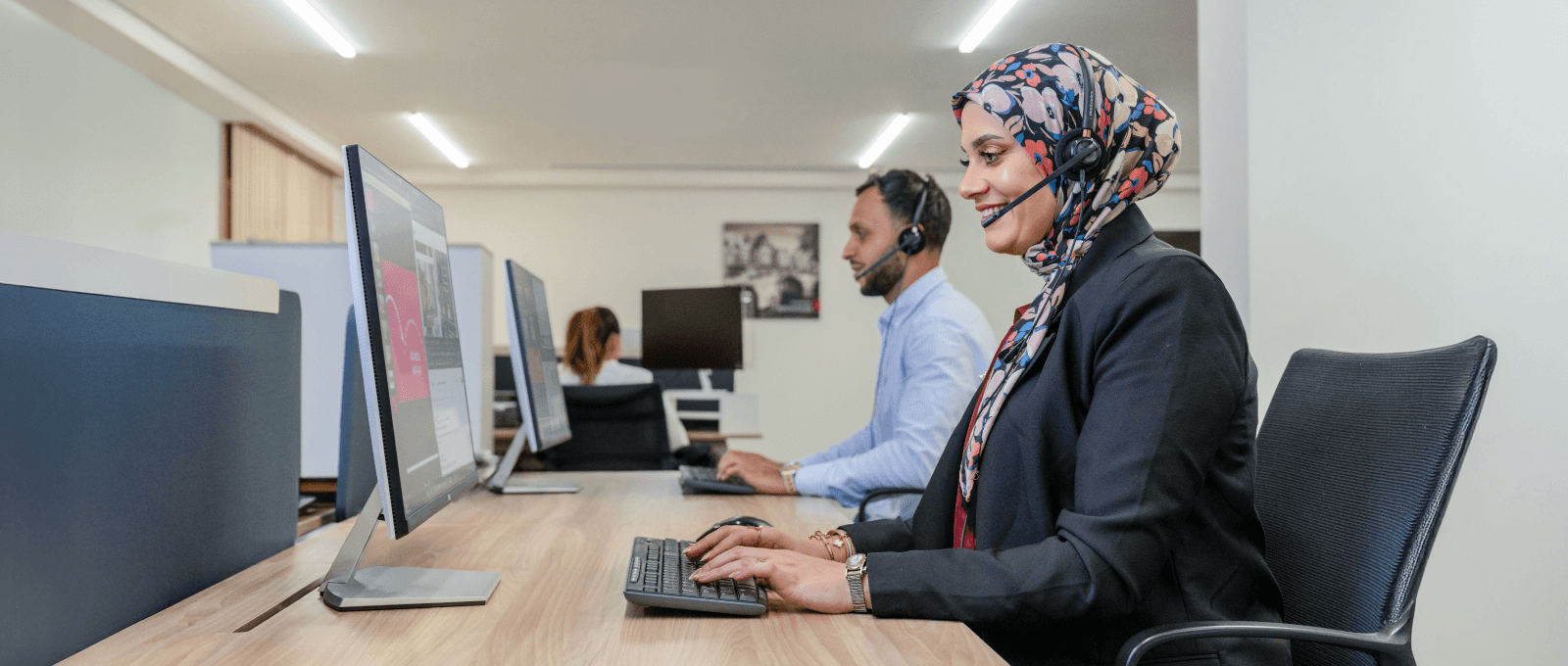 Staff working in a customer call-center - GoToConnect vs RingCentral 