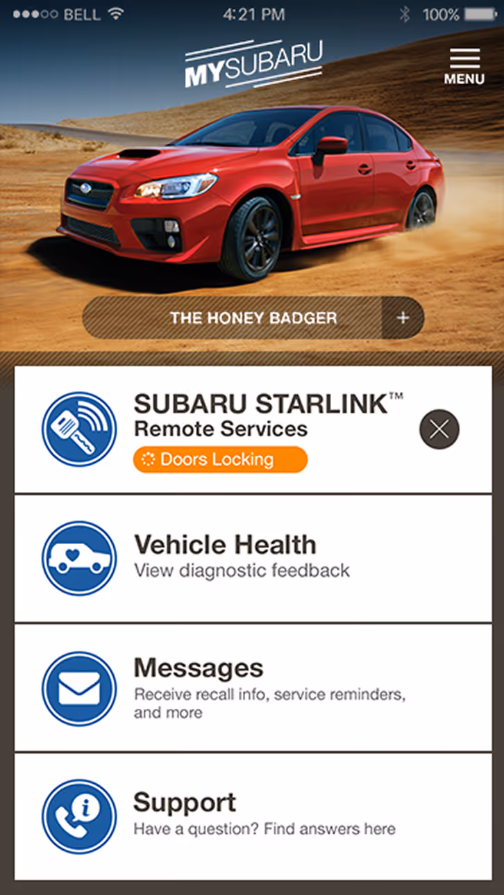 Mobile app screen showing a red Subaru sedan on a desert background with menu options for Subaru Starlink remote services, vehicle health, messages, and support.