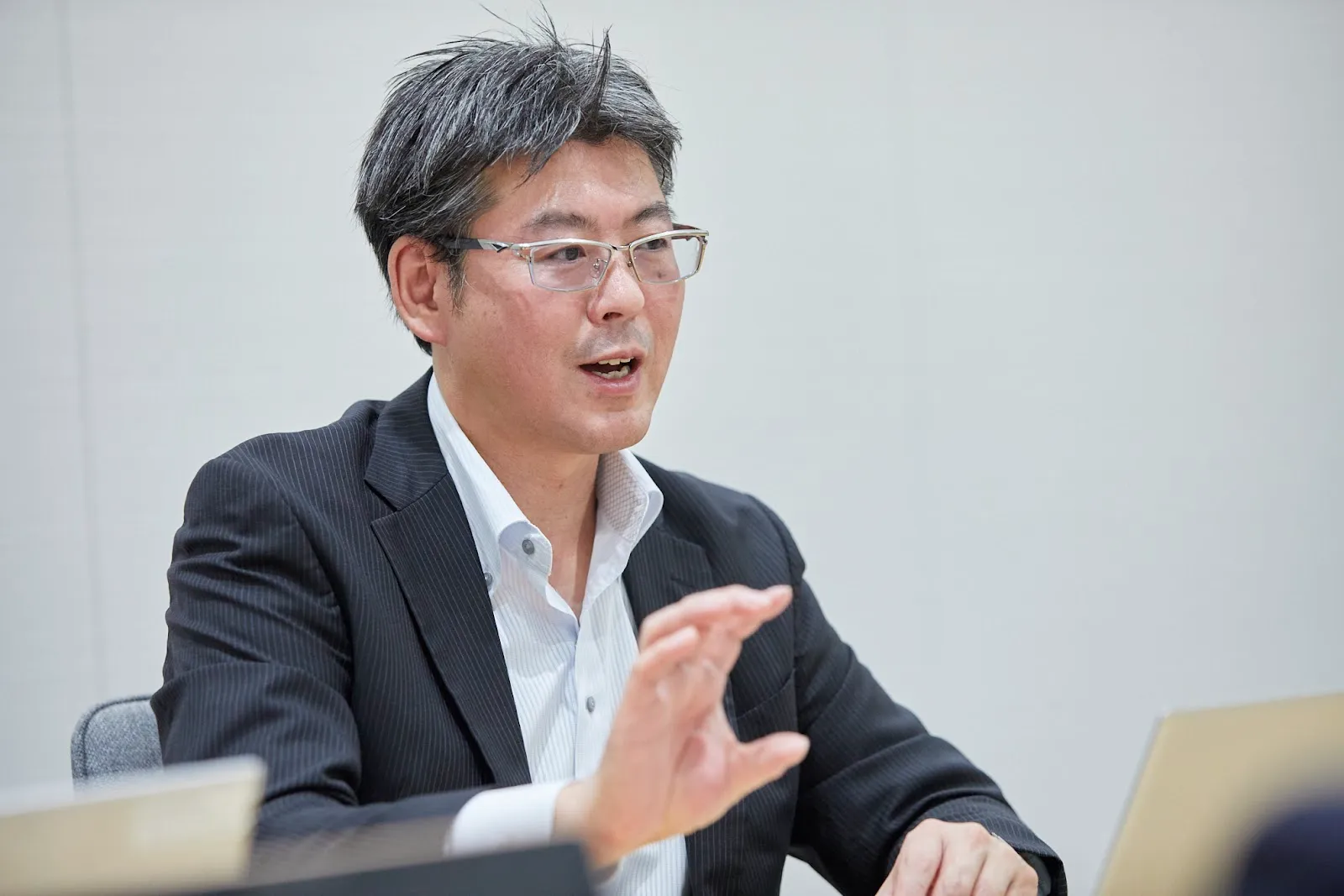 mentoの管理職コーチを導入した JT 部長 佐藤大輔さん