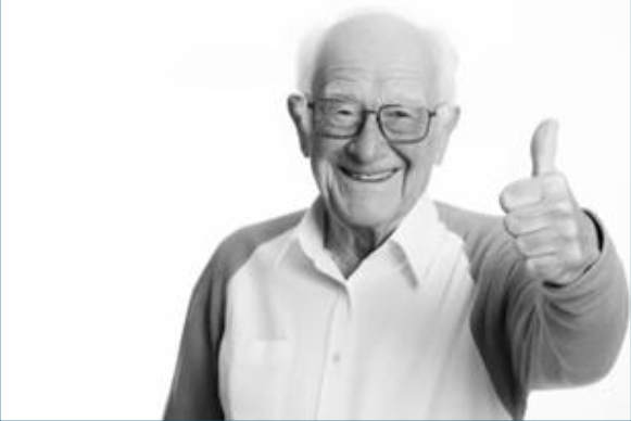 Happy senior citizen giving a thumbs up