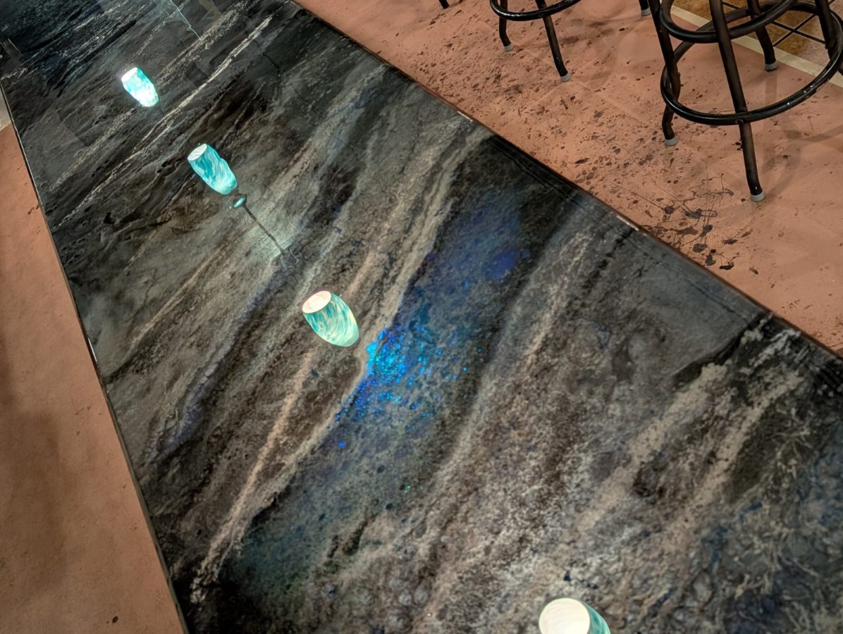 Black and blue metallic epoxy bar top with built-in lights
