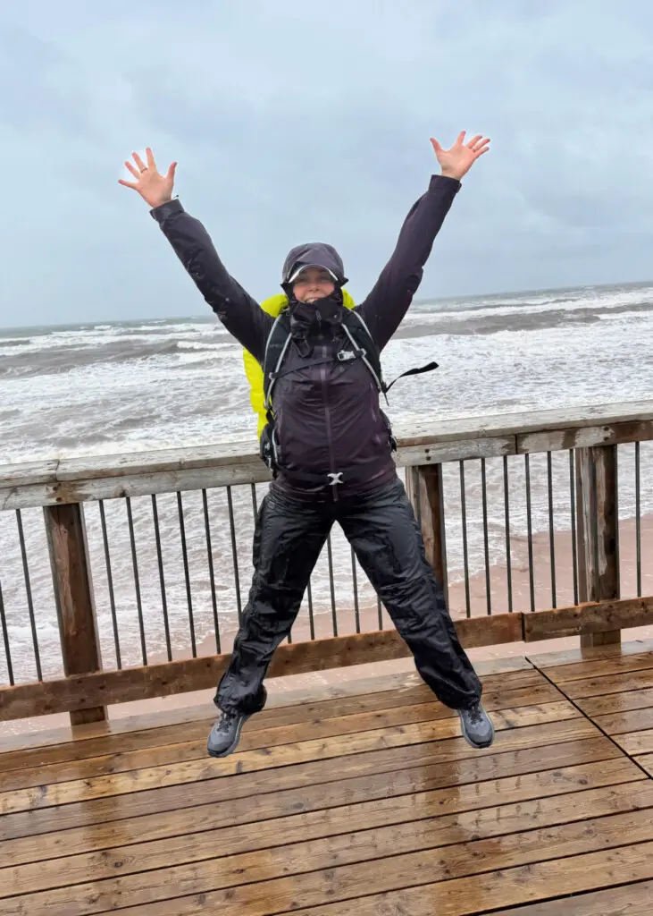 lady jumps in the rain