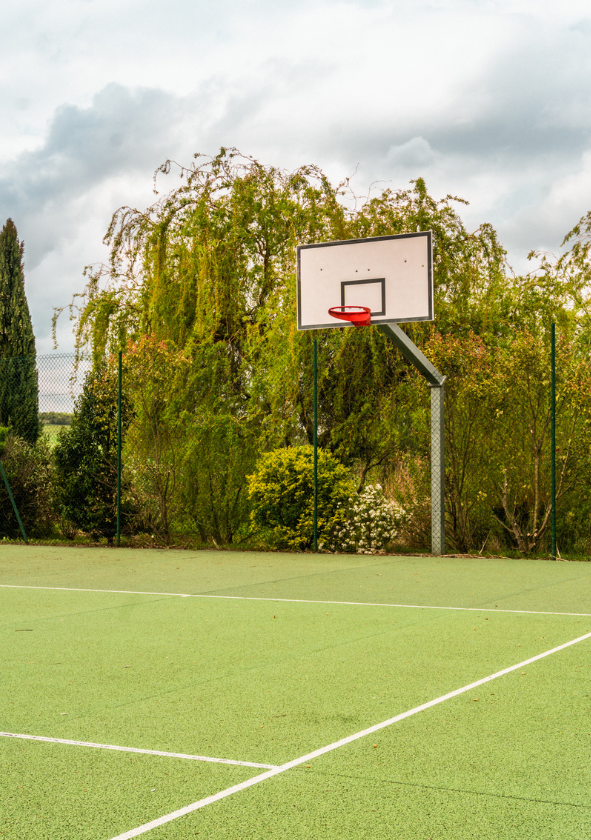 A tennis session on a peaceful estate, the perfect place to practice this sport in a tranquil, natural setting.