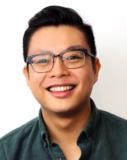 Brian Luo, Strategy & Operations Lead, smiling in a green shirt.