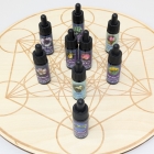 a display of several flower essence bottles on Metatron's cube