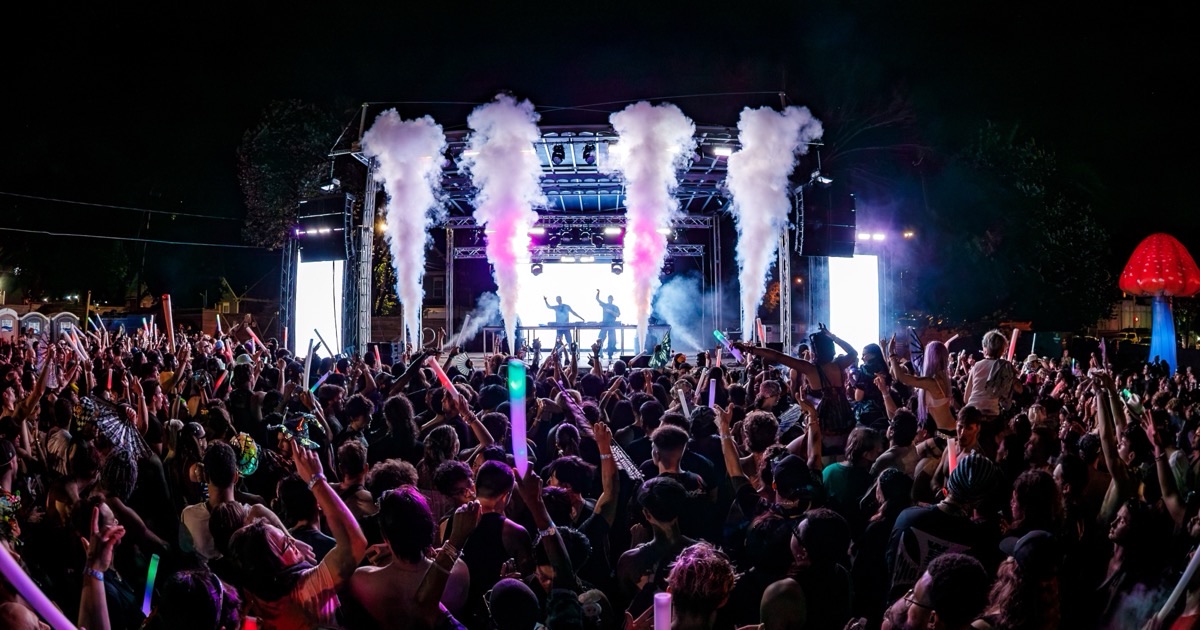 Festival crowd and LED wall with staging by True Productions