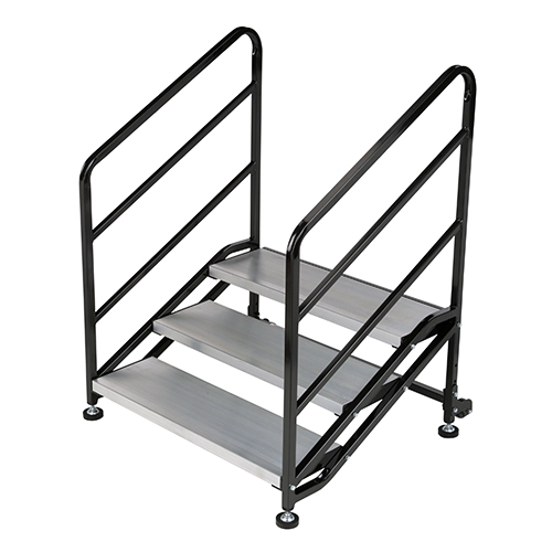 Modular stage stair unit with black hand railings for stage access