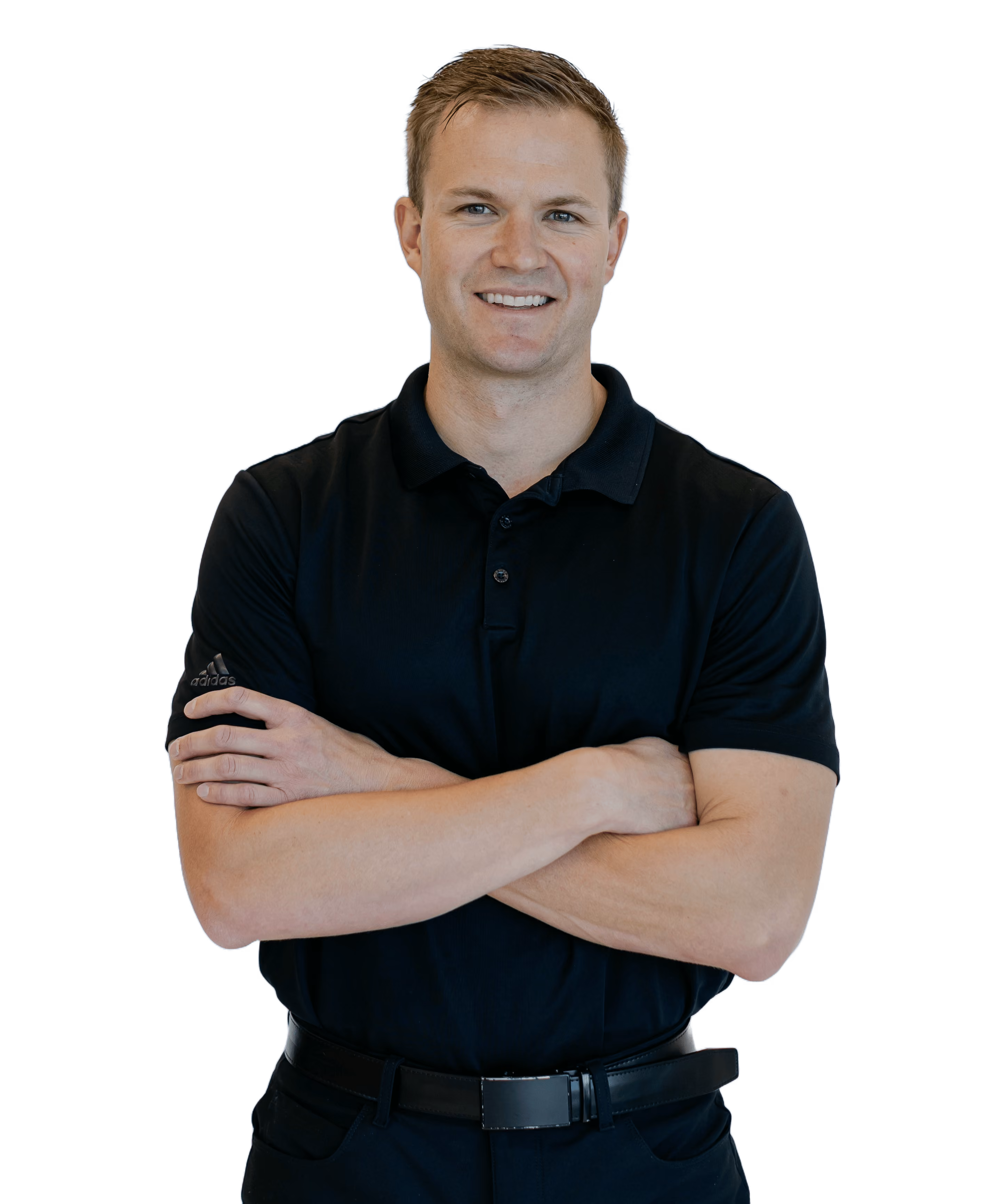 Dr Stringam with short hair wearing a black polo shirt, arms crossed.