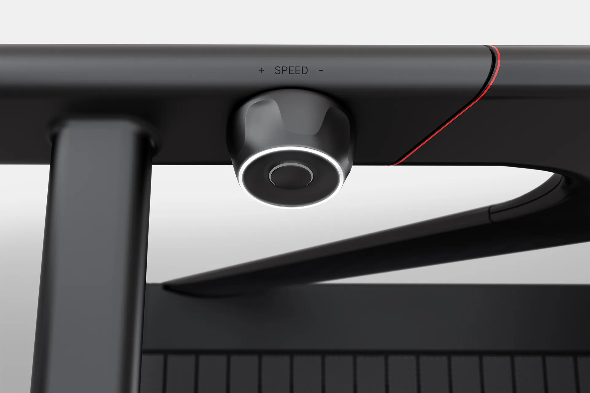 Detail shot of Peloton tread speed dial in a white studio environment