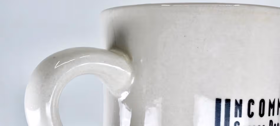 Bump textures on a coffee cup give extra sharp realism.