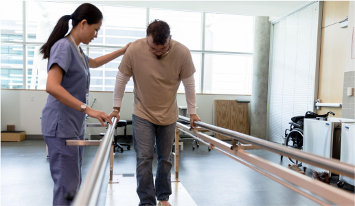 Physical therapy specialist helping out a patient