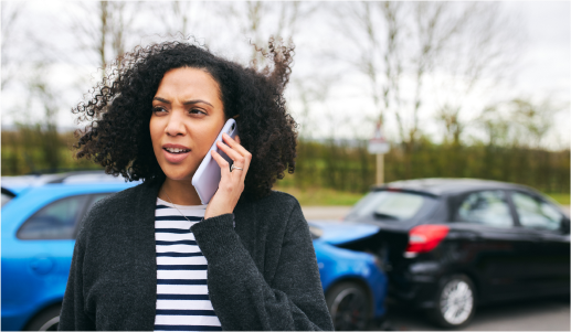 Women talking on phone after a no-fault car accident injury