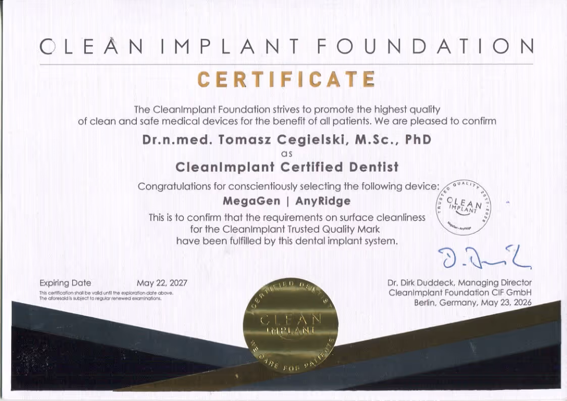 CleanImplant certificate in English for Dr. Tomasz Cegielski, confirming training in the AnyRidge implantology system.