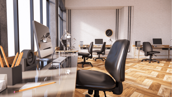 Shiny office tables and chairs in a Miami office, reflecting a pristine and polished look after being cleaned and polished by Yeshua Cleaning professionals.