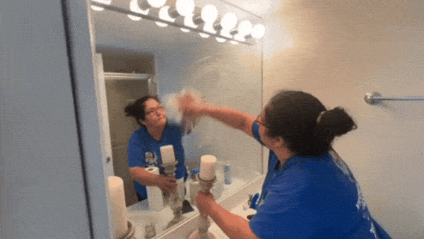 2 yeshua cleaning employees cleaning a 2 bedroom 2 bathroom apartment in miami.