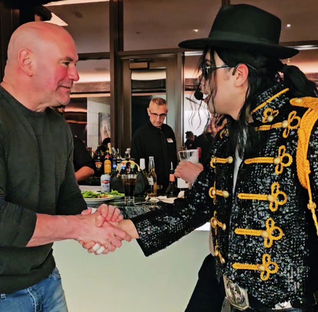 Maxx Vega MJ tribute artist shaking hands with Dana White Las Vegas private event