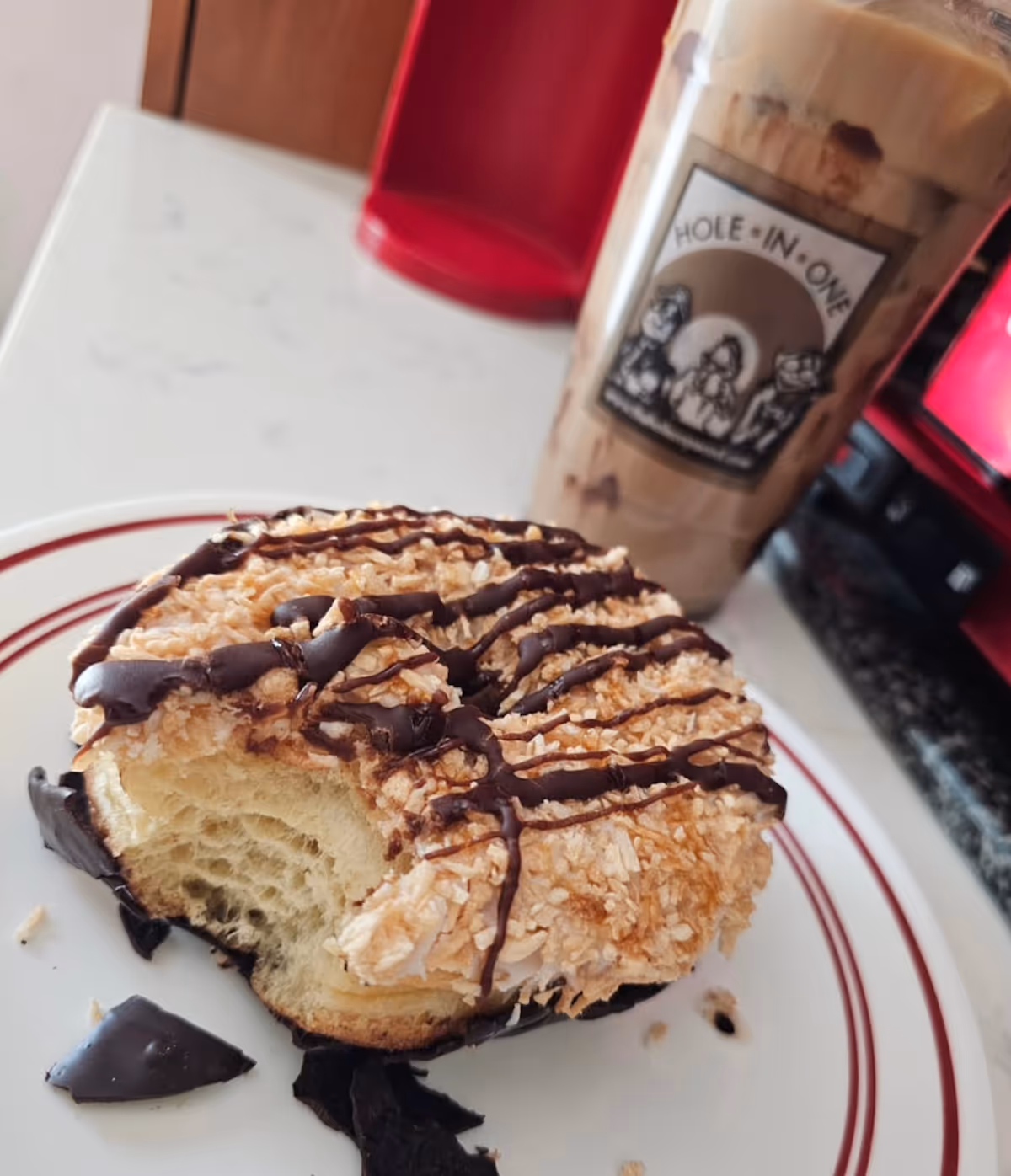 Coffee and donut at Hole in One