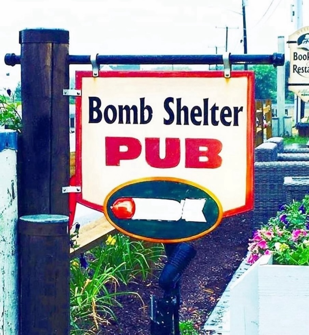 The age old sign for The Bomb Shelter Bar in Wellfleet MA.