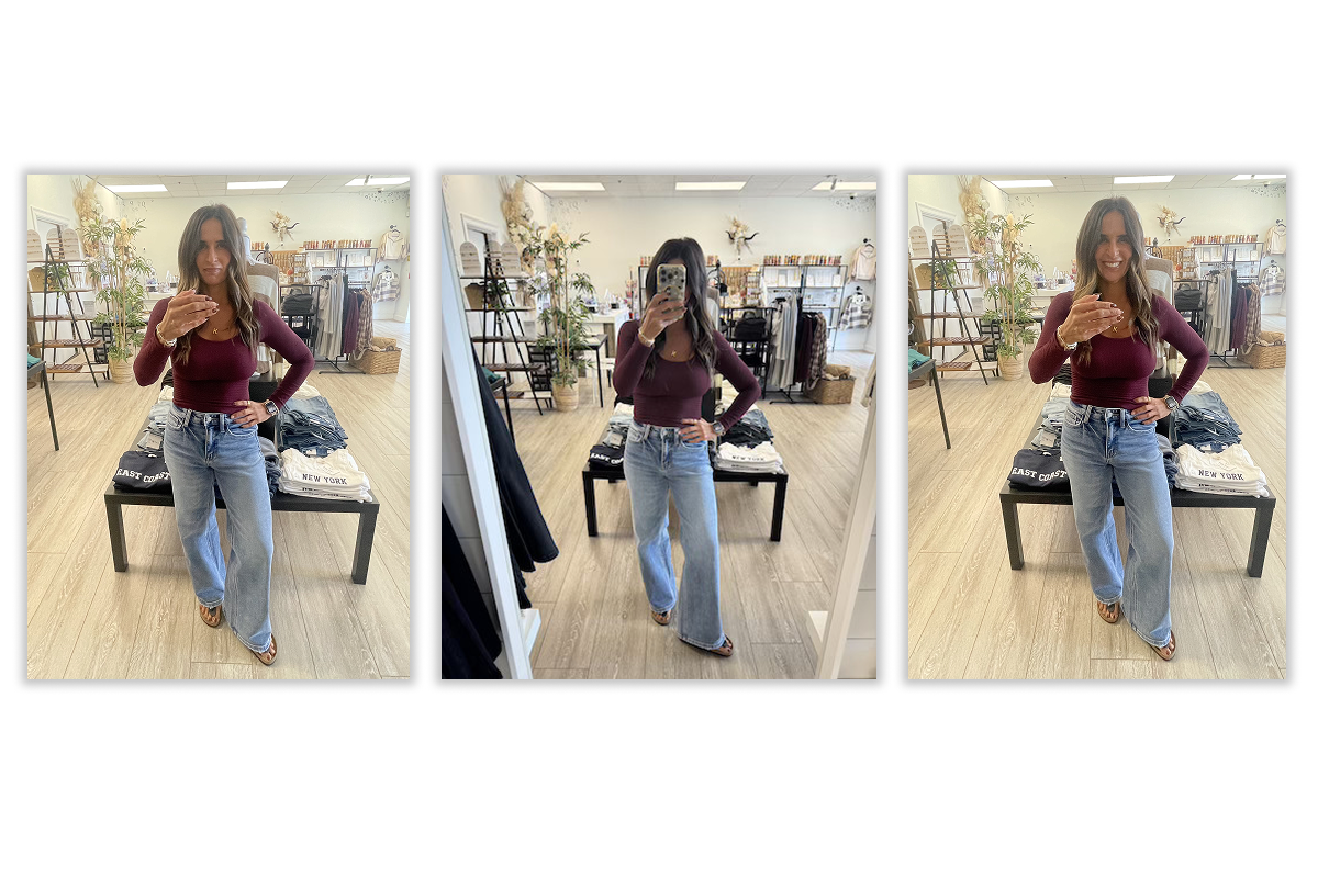 Kelly Lungo in her Orleans shop, Salty Crown Boutique posing for a mirror selfie.