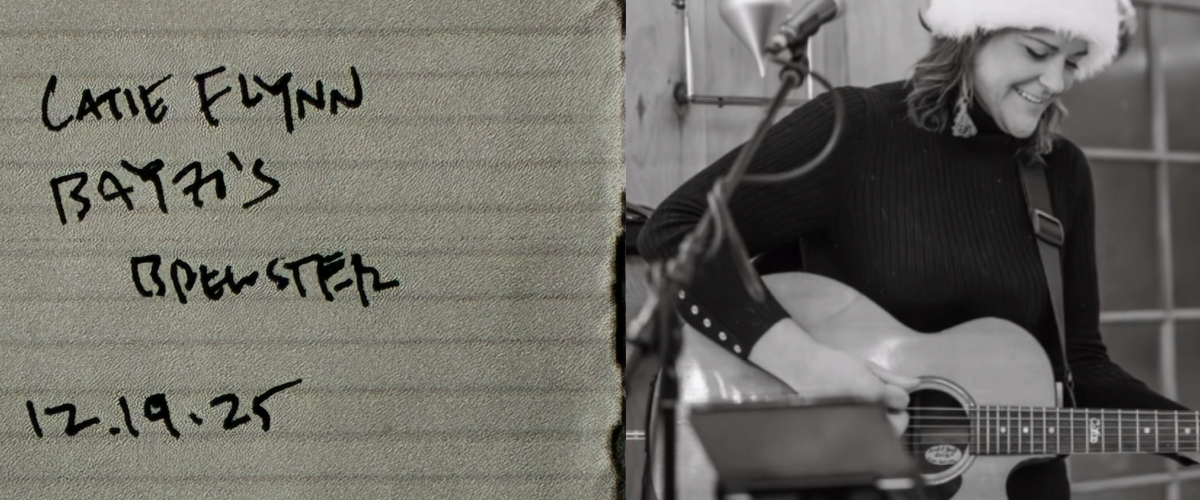 Catie Flynn in a Santa Hat singing & playing acoustic guitar somewhere on Cape Cod - maybe Bayzo's Pub.