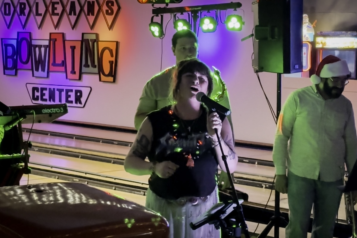 Funktapuss & Siobhan Magnus performing on the lanes at The Alley BBQ & Bowling in Orleans, MA for Seaside Cannabis's 2025 Holiday Party