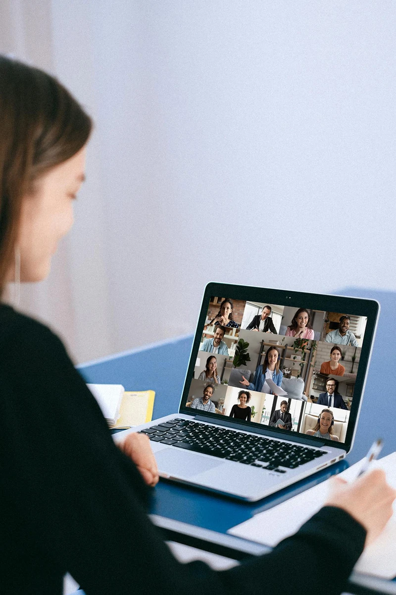 a person on a laptop in a virtual meeting