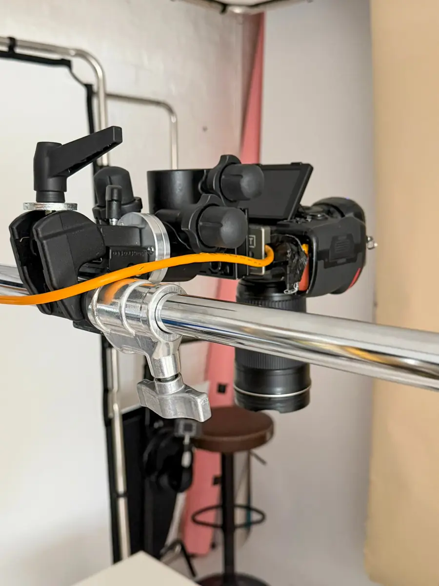 Camera mounted on an overhead rail rig, tethered for shooting at Dock Street Studio Leeds