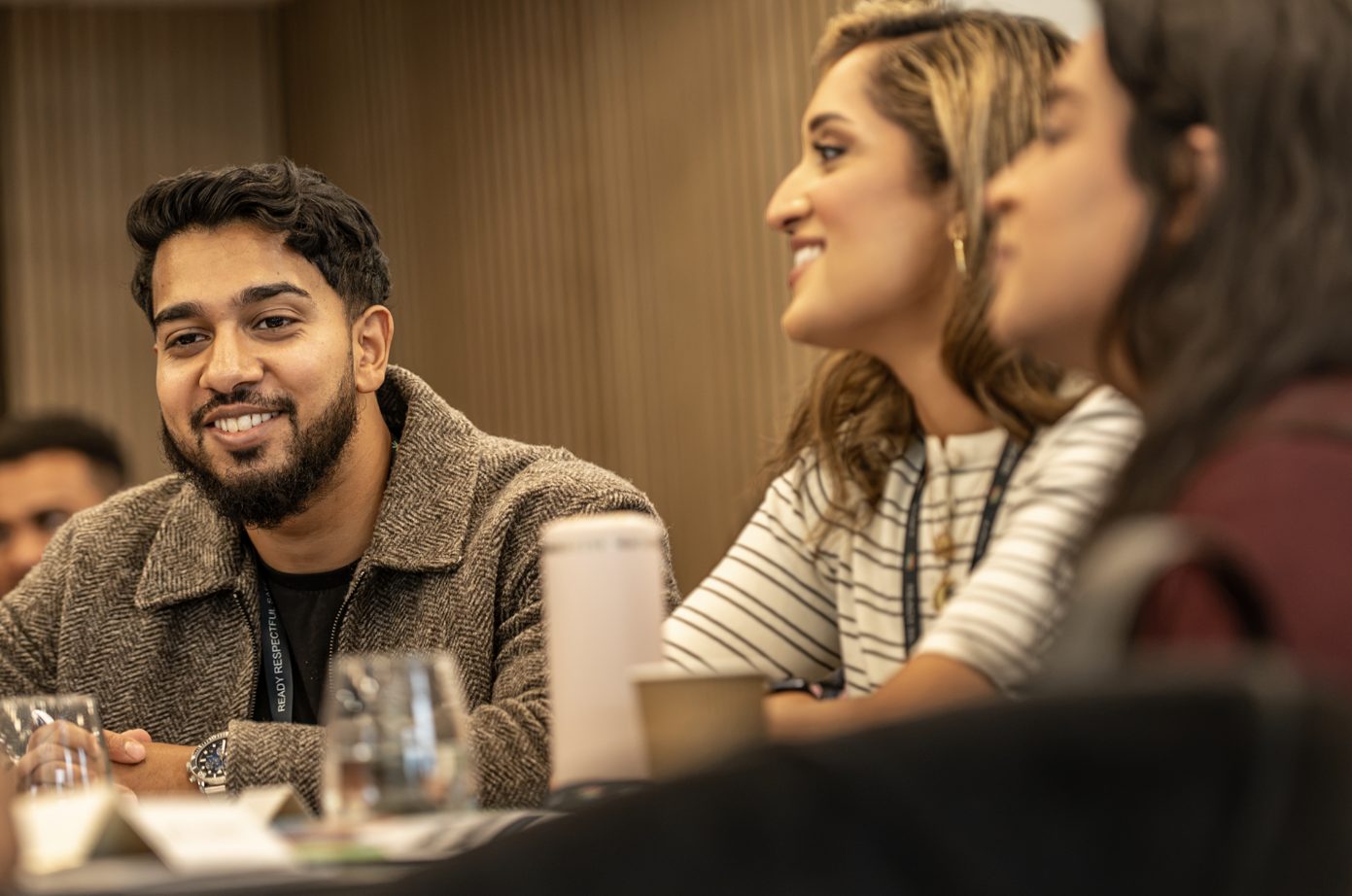 Delegates listening during a panel session at a corporate conference in Leeds, photographed by Dock Street Studio