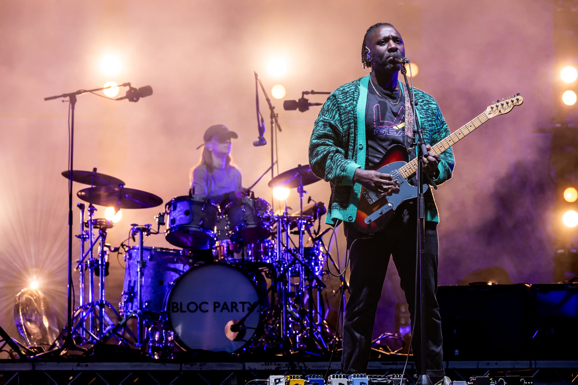 Bloc Party performing live under stage lighting, photographed by Dock Street Studio