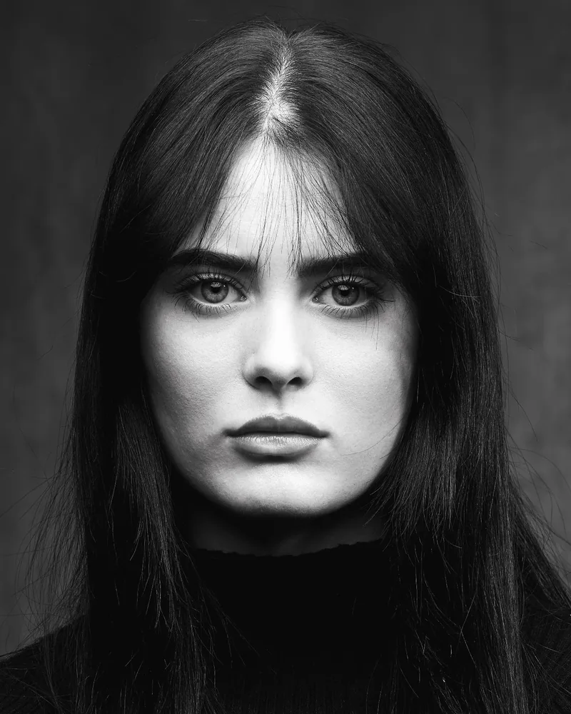 Black and white headshot with directional lighting, shot at Dock Street Studio in Leeds