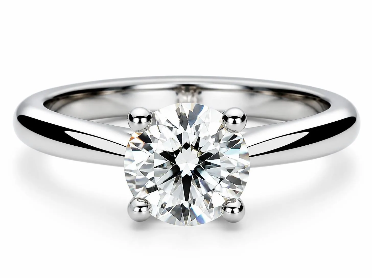 Diamond solitaire ring in platinum with a soft dark reflection band along the polished shank, giving the metal depth and definition