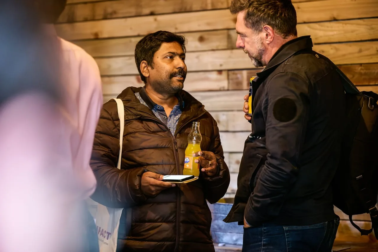 Group of founders and investors chatting with drinks at Raising Early Stage Investment, hosted by HSBC Innovation Banking for Leeds Digital Festival — event photography by Dock Street Studio, Leeds