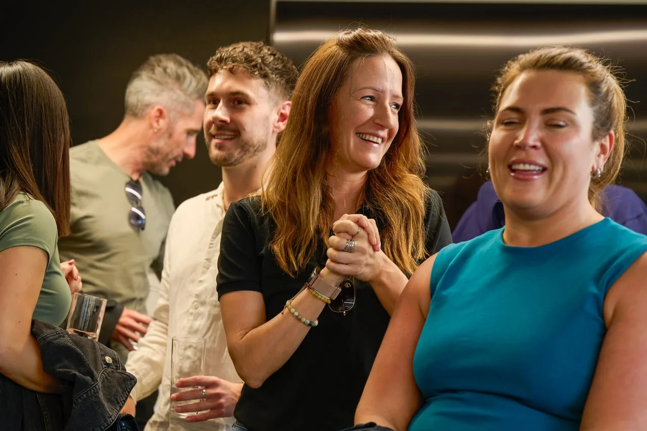 Guests laughing during networking at Insights from the Leeds Tech Map, hosted by Alt Legal for Leeds Digital Festival in Leeds — event photography by Dock Street Studio, Leeds