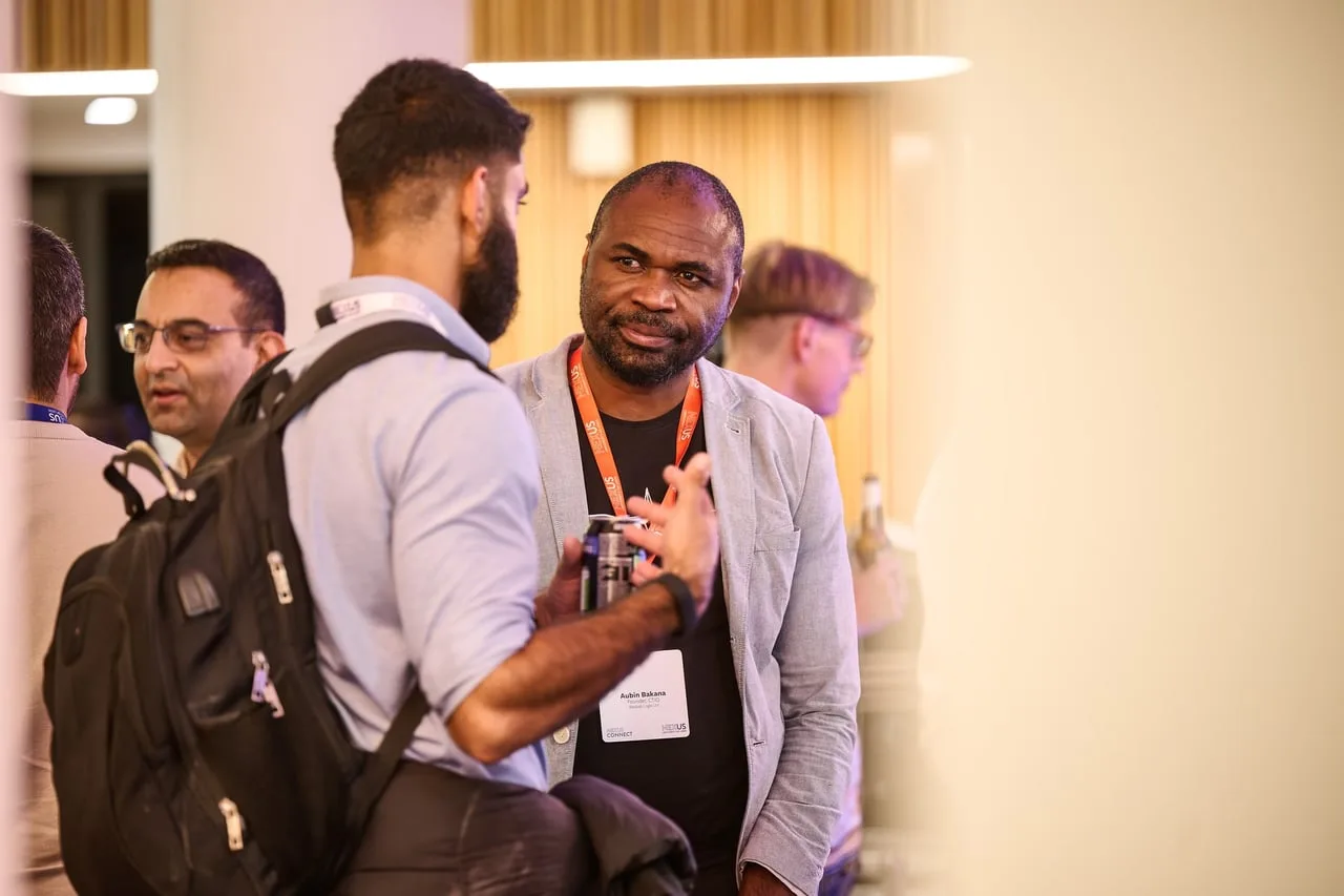 Smiling attendee with an orange Nexus lanyard at NEXUS Connect: Failure is an Option, hosted by Nexus, University of Leeds, for Leeds Digital Festival — event photography by Dock Street Studio, Leeds