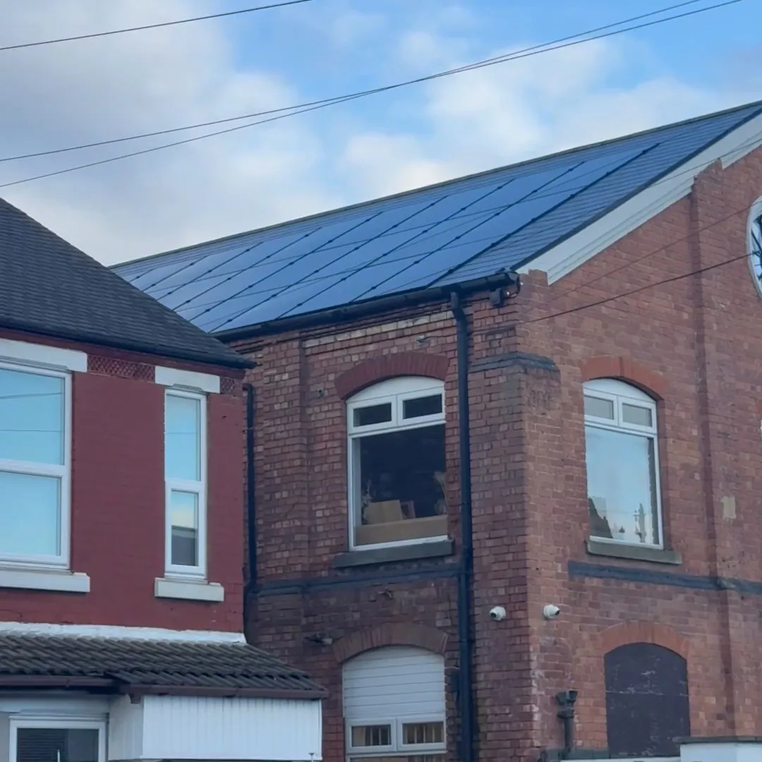 All-black solar panels built into the roof of the Boyes Design workshop in Netherfield