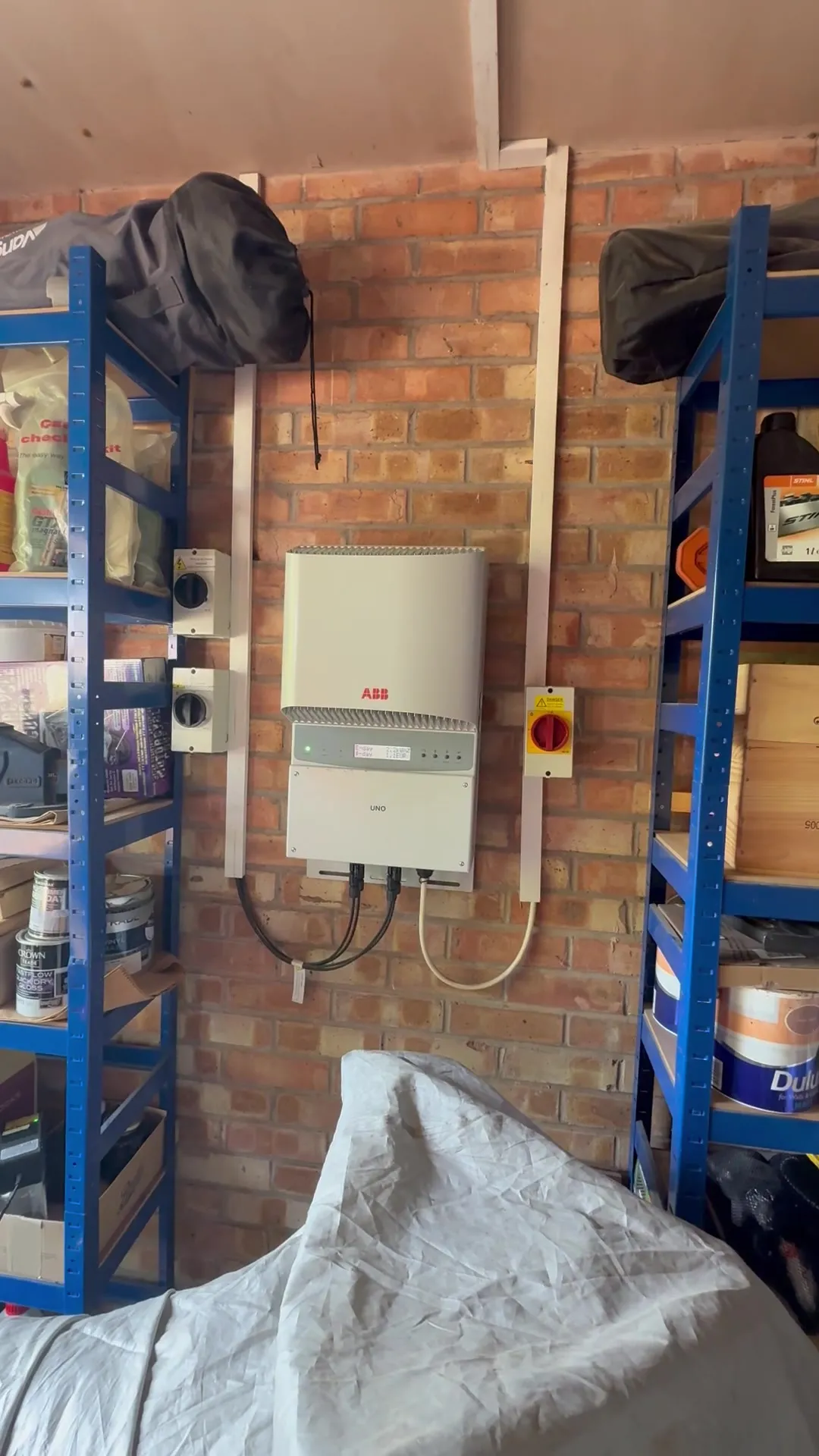 The original inverter on an older Feed-in Tariff solar system, before a battery was added