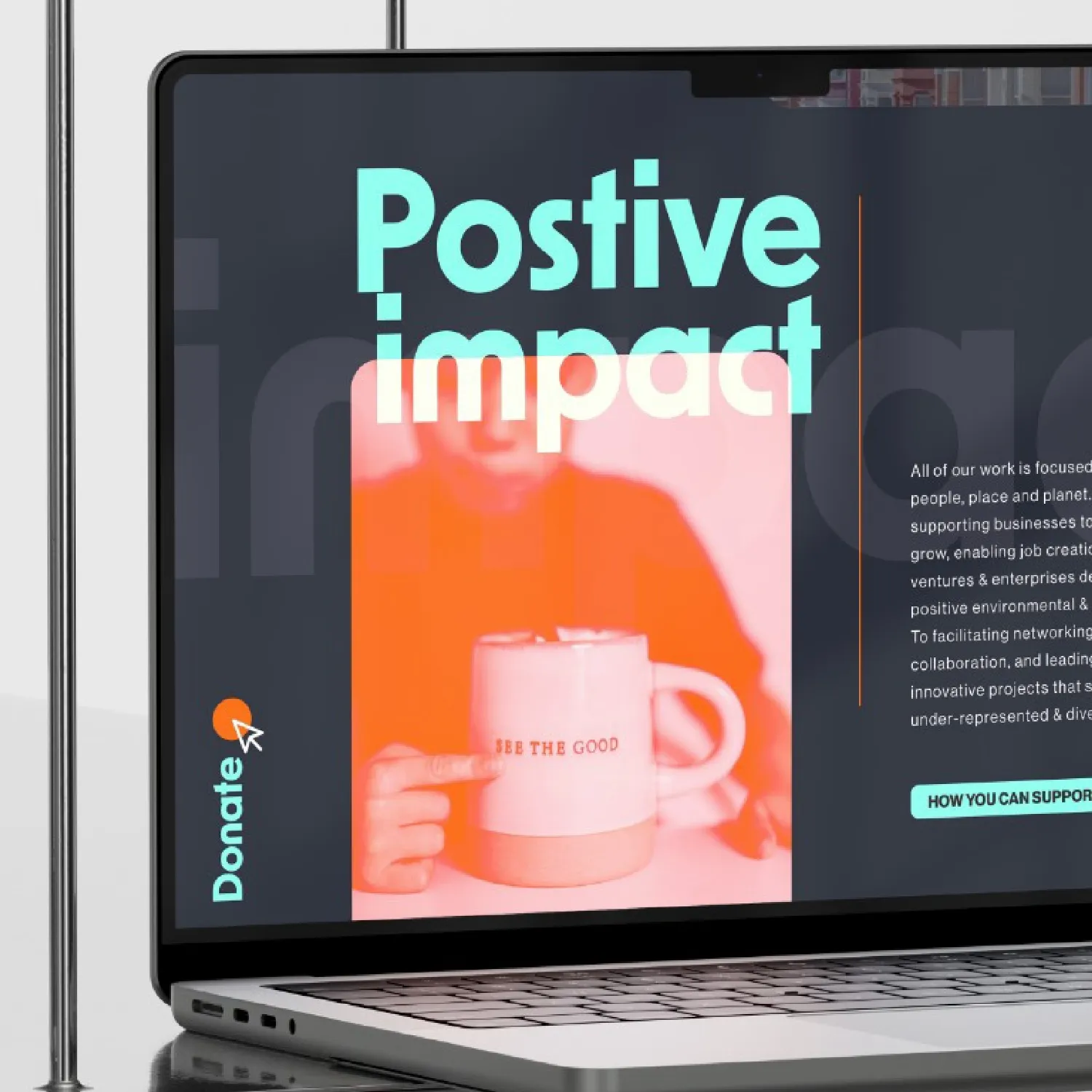 A laptop screen with a positive impact website.