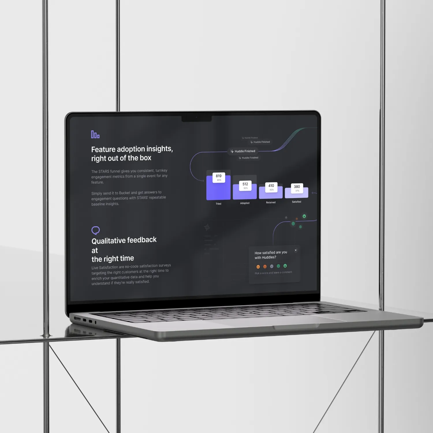 A laptop screen with a black background and a white logo.