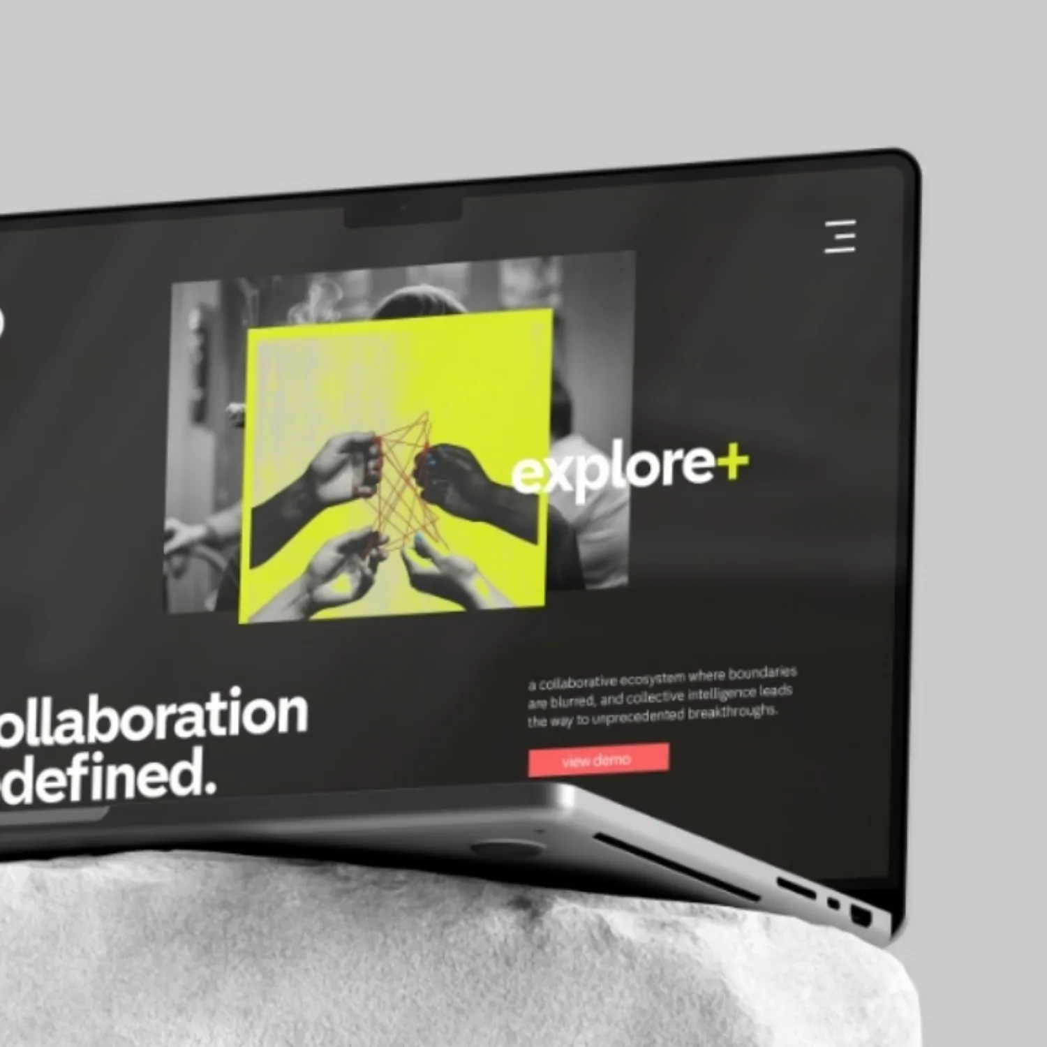 A laptop screen displaying a website about collaboration.