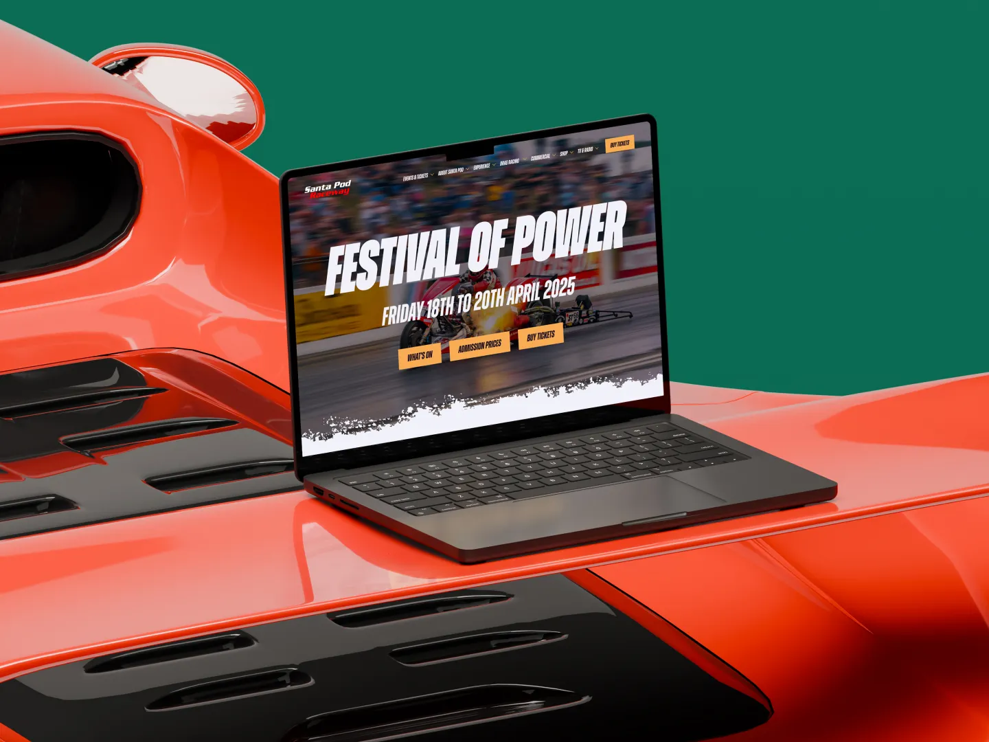 A laptop with a red car on the screen.
