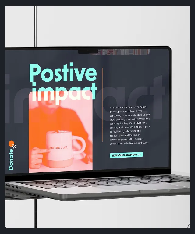 A laptop with a screen that says Positive Impact.