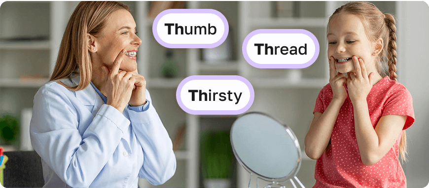 A woman and a child standing in front of a mirror, both smiling and touching their mouths as they practice the 'TH' sound by pronouncing words 'Thumb' 'Thread' 'Thirsty'