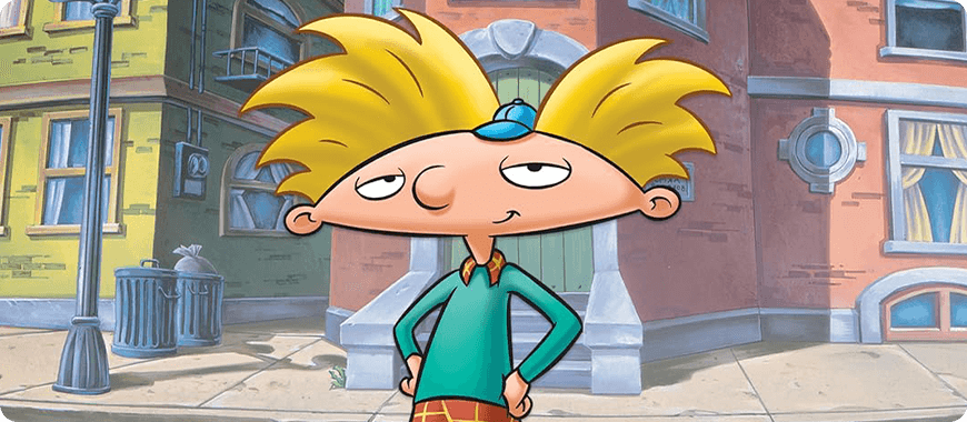 Hey Arnold! standing confidently on the city street — urban adventures with witty, fast-paced dialogue perfect for intermediate ESL learners.