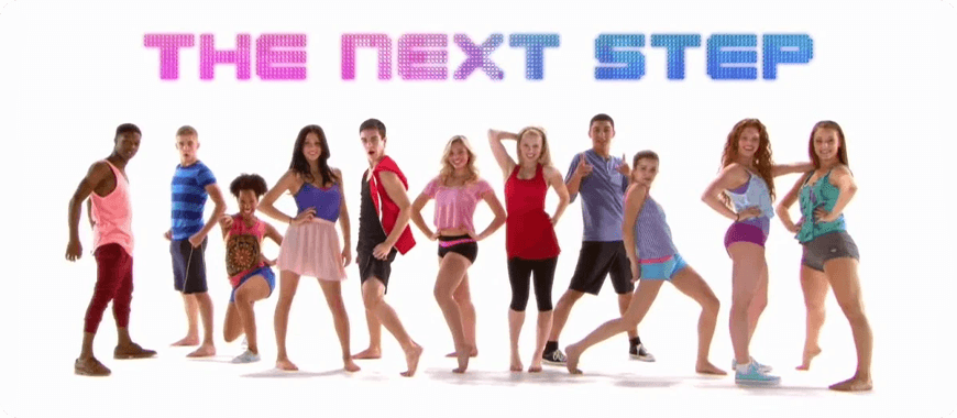 The Next Step dance crew posing confidently — teen drama with natural conversations, emotional vocabulary, and real-life school & friendship themes.