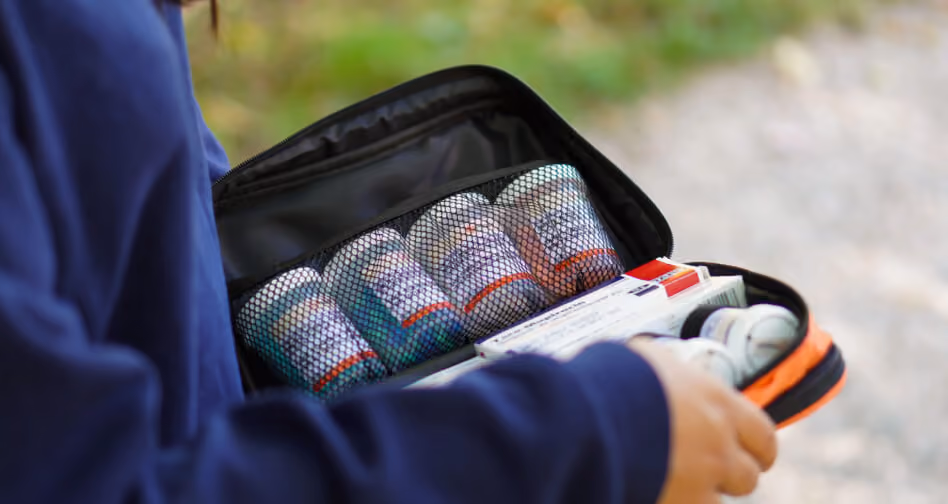 prepare medical carrying case filled with medication