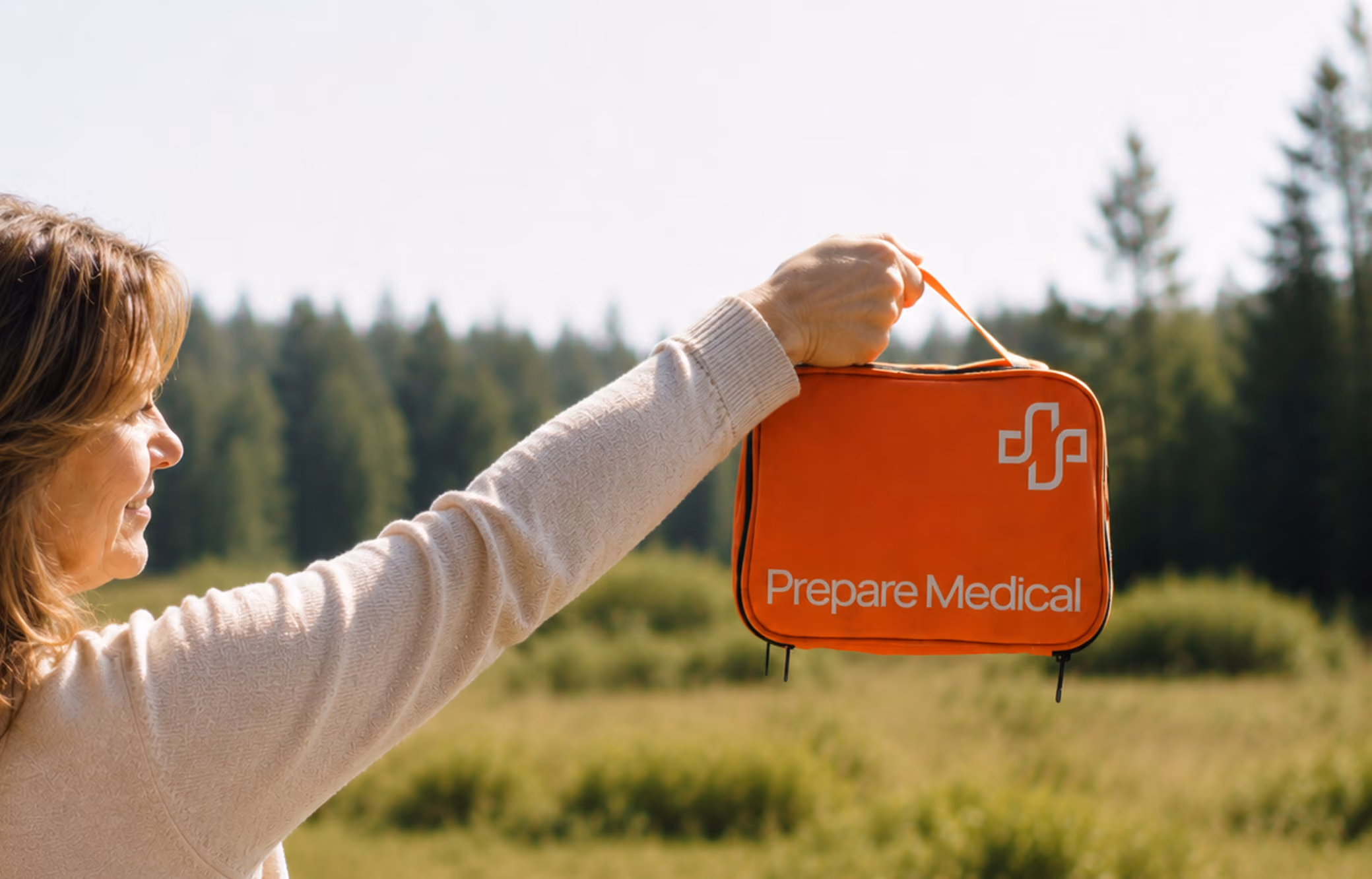 an image showing an orange first-aid kit on an airplane seat near the window
