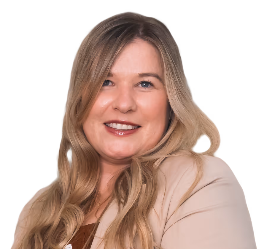 Smiling woman with long blonde hair wearing a beige jacket.