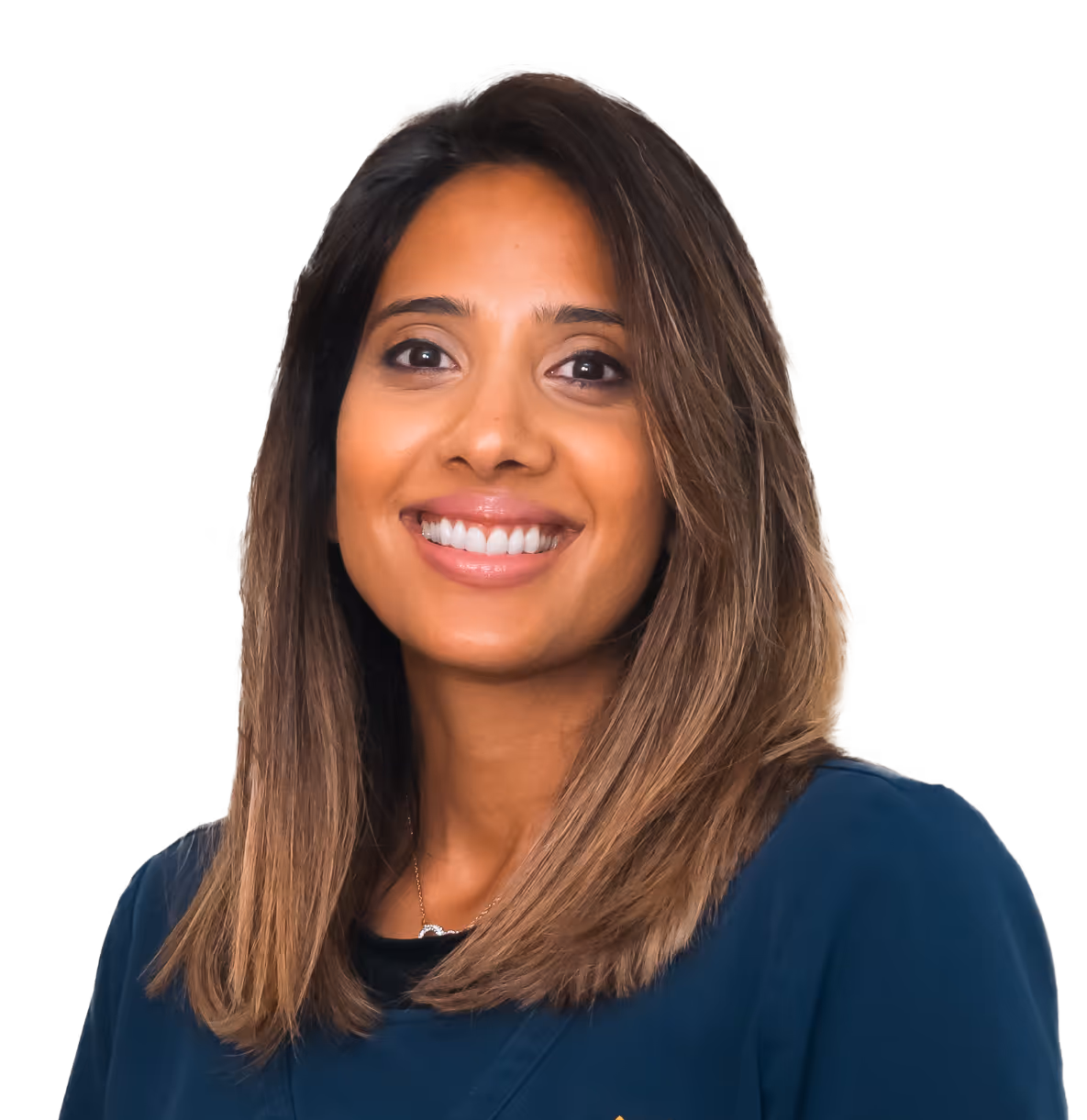 Smiling woman with shoulder-length brown hair wearing a dark blue medical scrub top with butterfly logo.